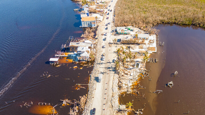 Debris on coastal land after flooding disaster