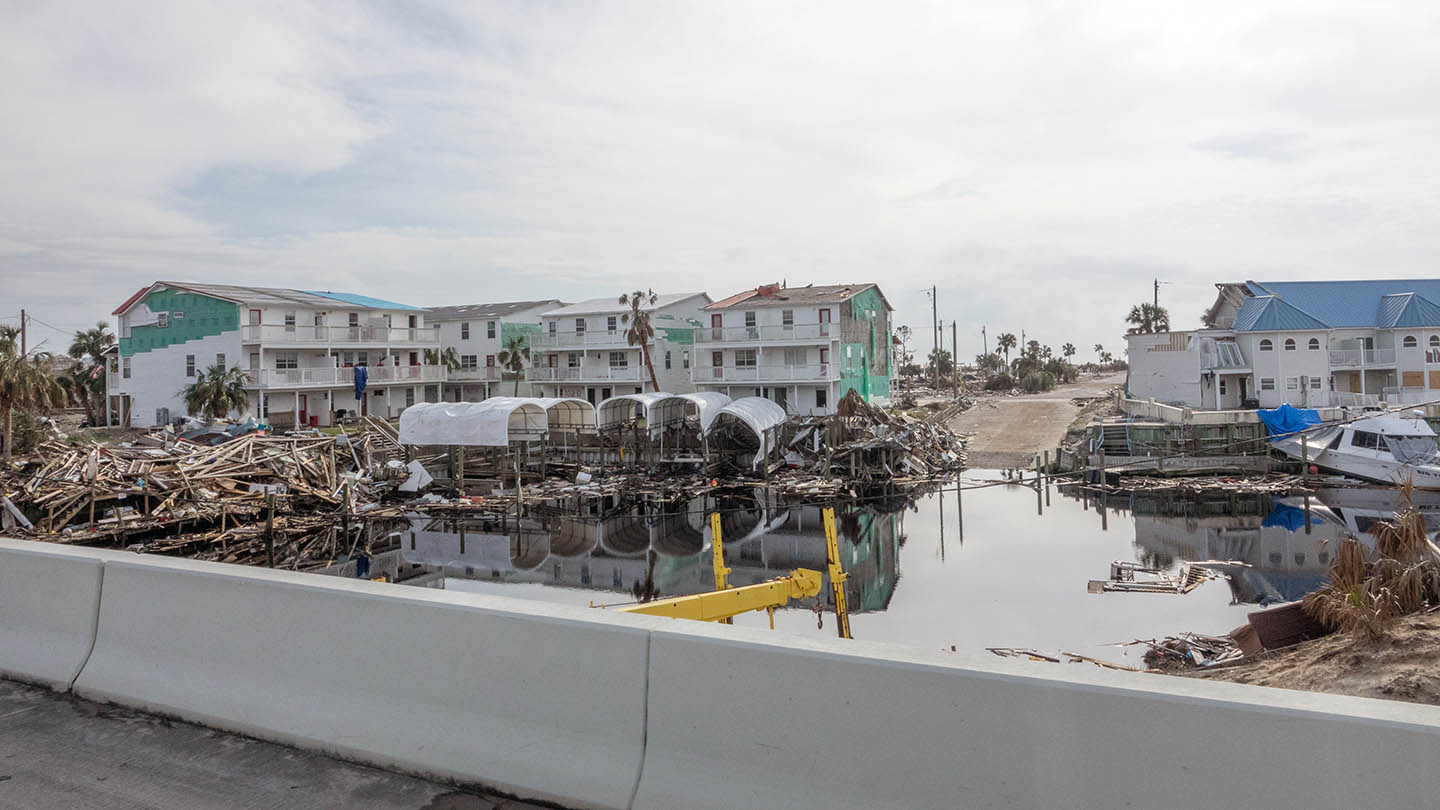 Marina destroyed by Category 5 Hurricane Michael, leaving behind debris and destroyed buildings on Gulf Coast